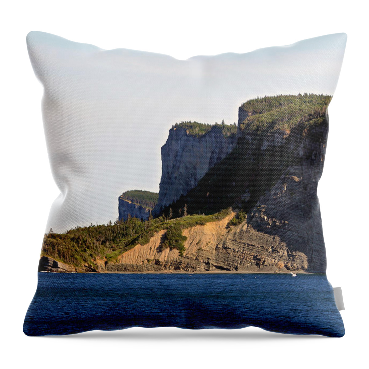 Forillon Throw Pillow featuring the photograph The Cliffs of Forillon by John Meader