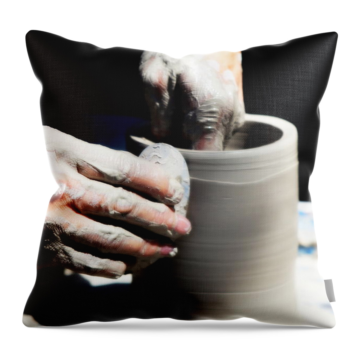 Potter Throw Pillow featuring the photograph The Potters Wheel by Imagery-at- Work