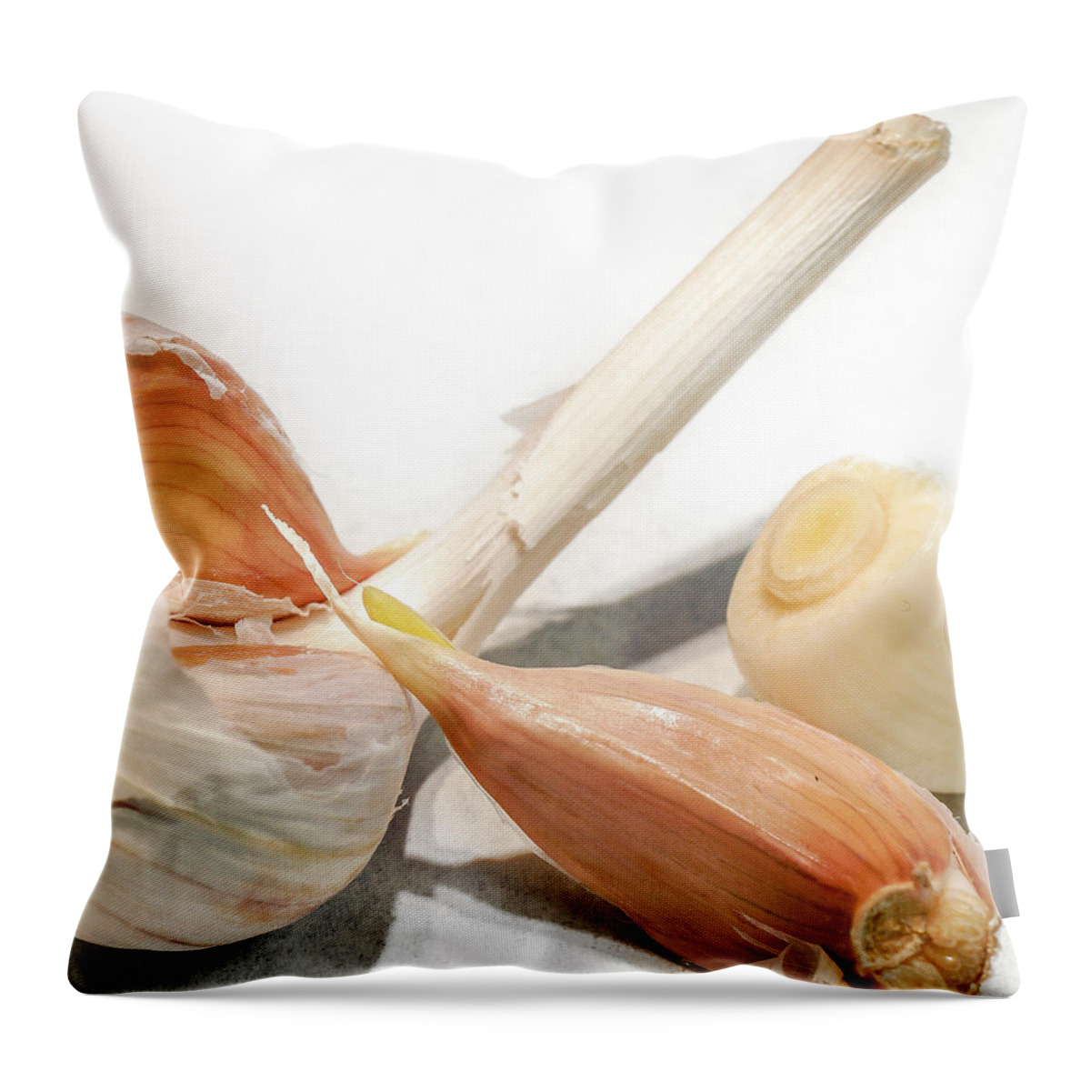 Allium Sativum Throw Pillow featuring the photograph The stinking Rose by Nick Mares