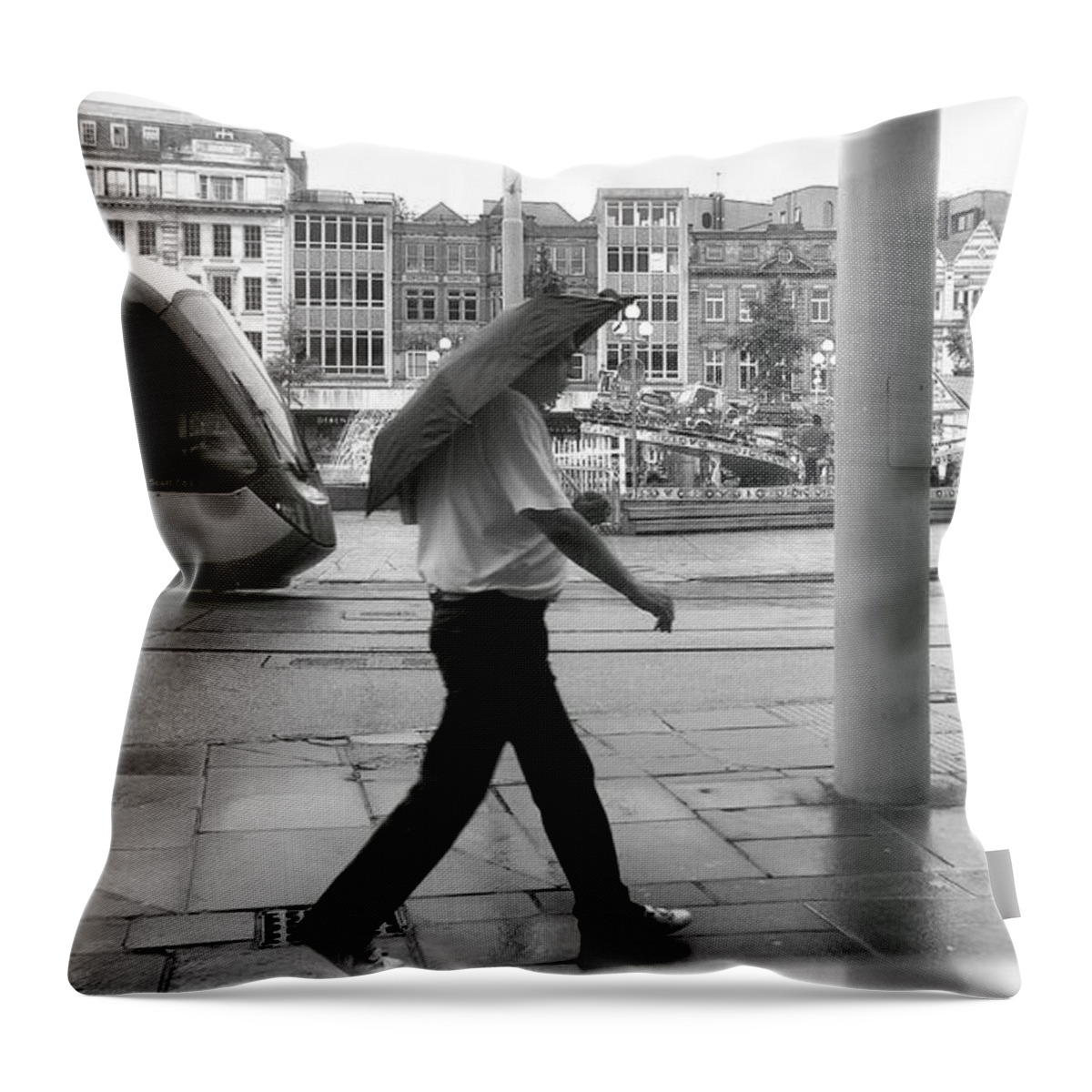 Architecture Throw Pillow featuring the photograph Tram in Rainy City by Ieva Kambarovaite