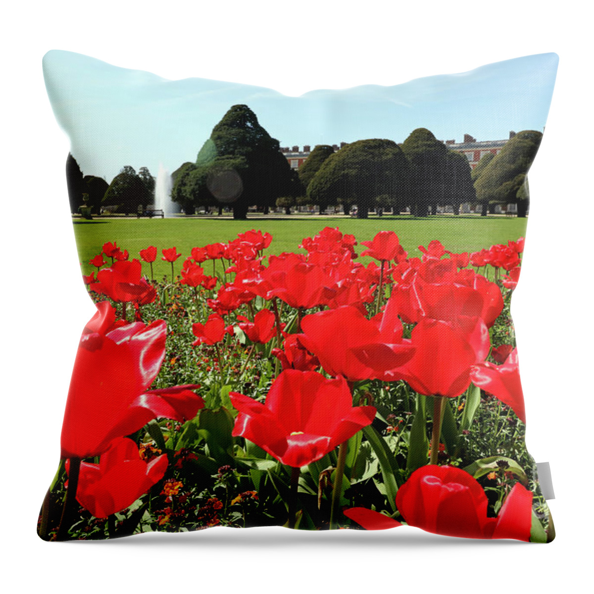 Spring Throw Pillow featuring the photograph Vibrant Red Tulips at Hampton Court by Julia Gavin