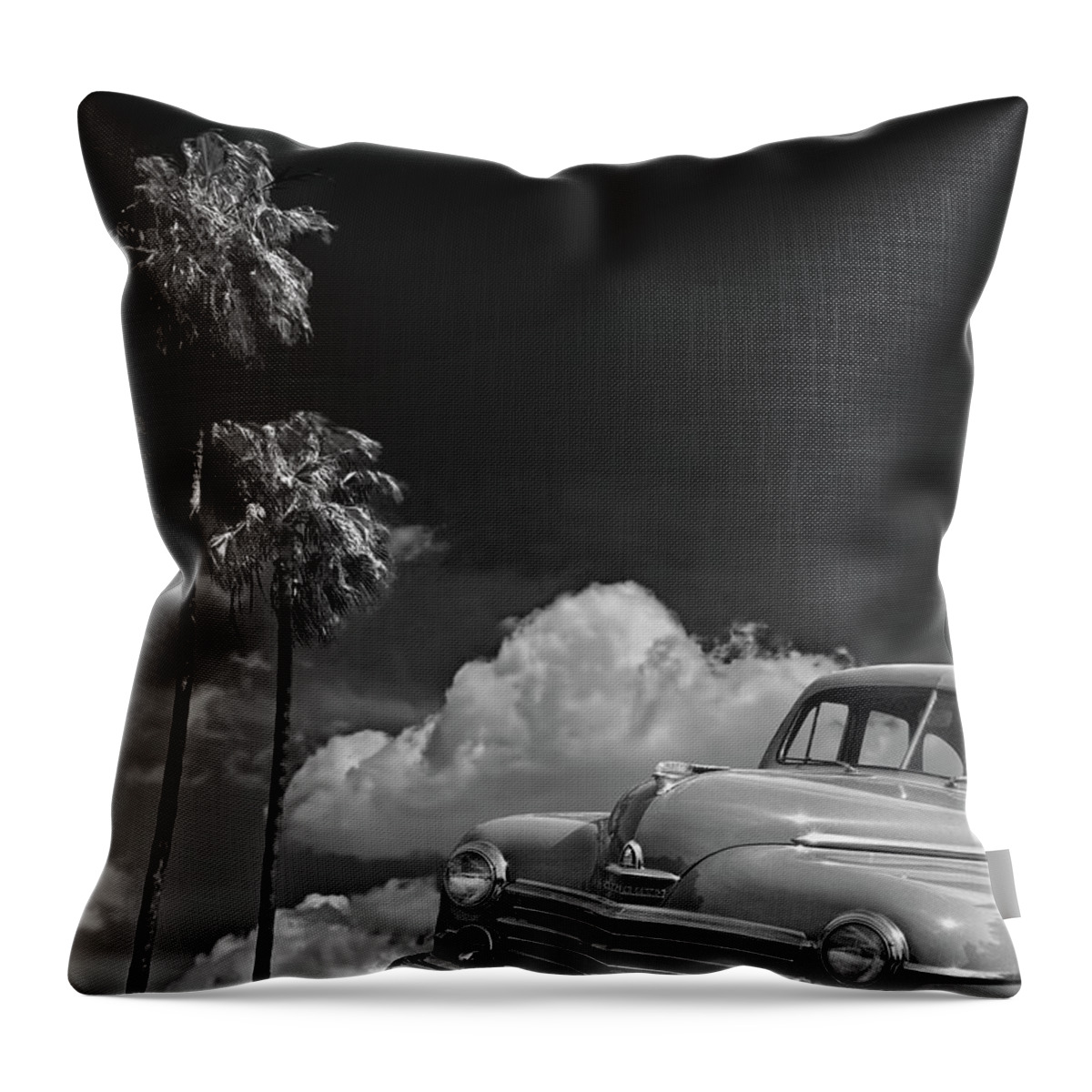 Car Throw Pillow featuring the photograph Vintage Plymouth Automobile in Black and White against Palm Trees by Randall Nyhof