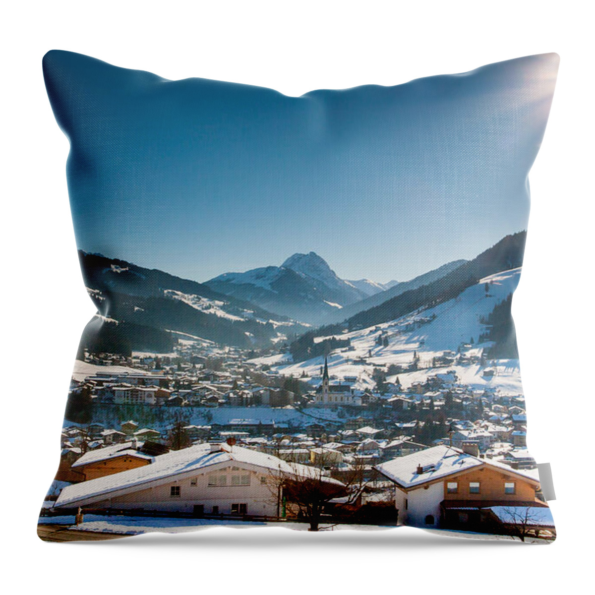 Austria Throw Pillow featuring the photograph Warm winter day in Kirchberg town of Austria by John Wadleigh