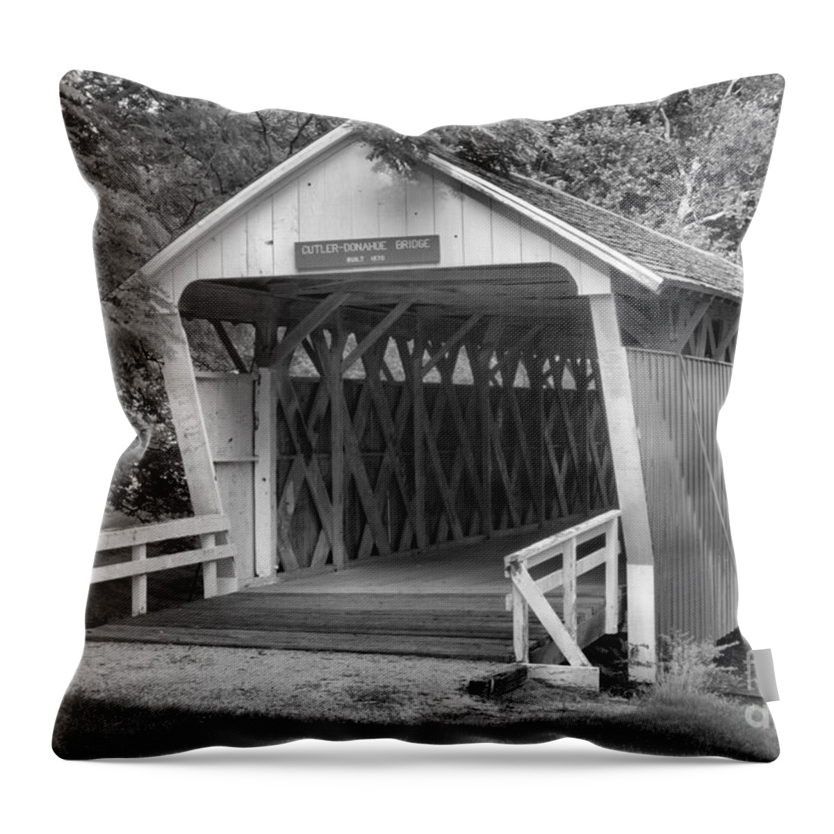 Cutler Donahoe Covered Bridge Throw Pillow featuring the photograph Winterset Iowa Covered Bridge Black And White by Adam Jewell