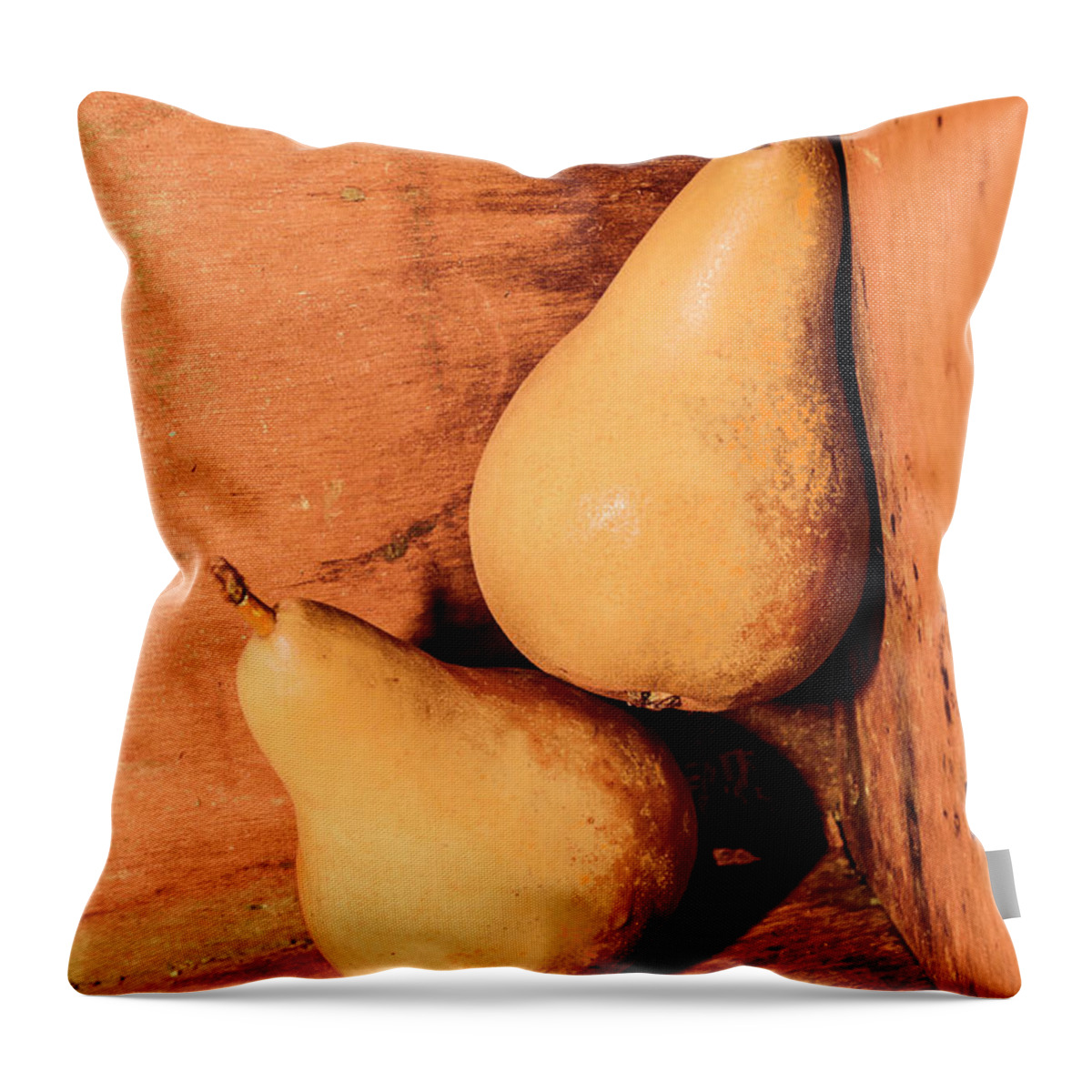 Pear Throw Pillow featuring the photograph Yellow colored pears on wooden background by Jorgo Photography