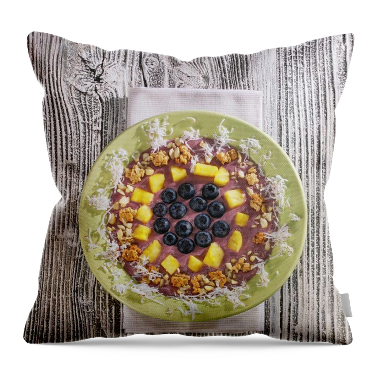 Ip_11980140 Throw Pillow featuring the photograph A Banana And Acai Berry Smoothie Bowl #1 by Karl Newedel