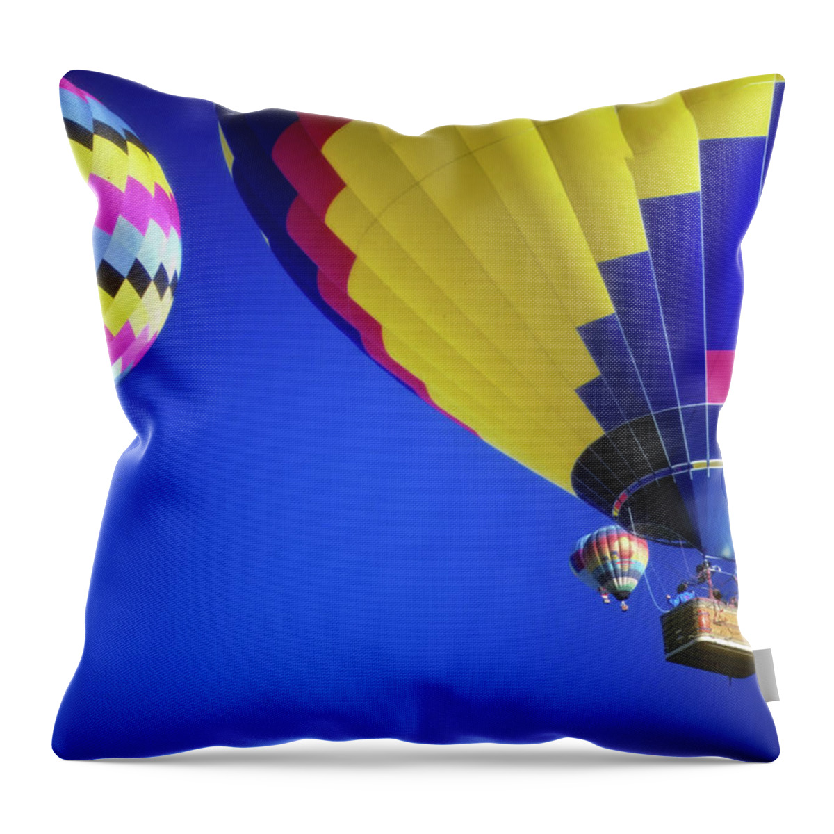 Hot Throw Pillow featuring the photograph Hot air balloons against blue sky #1 by Steve Estvanik