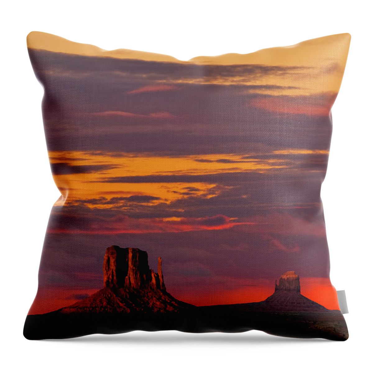 Arid Climate Throw Pillow featuring the photograph The Mittens and Merrick Butte at Sunset #1 by Jeff Goulden