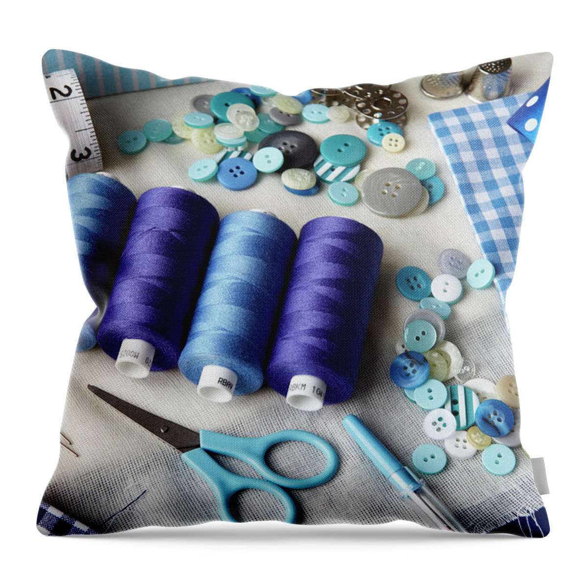 Working Throw Pillow featuring the photograph Thread, Buttons, Measuring Tape On Desk #1 by Debby Lewis-harrison