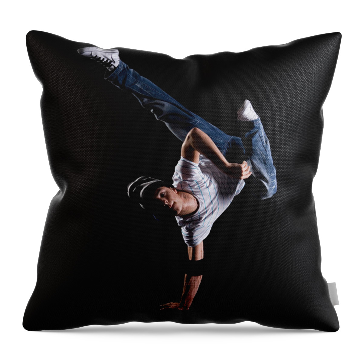 Expertise Throw Pillow featuring the photograph A B-boy Doing A K-kick Breakdance Move by Halfdark