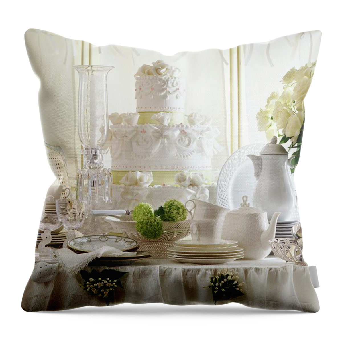 Ip_11297576 Throw Pillow featuring the photograph A Bunch Of White Roses And Artistically Decorated Wedding Cake On A Table by Laura Rizzi