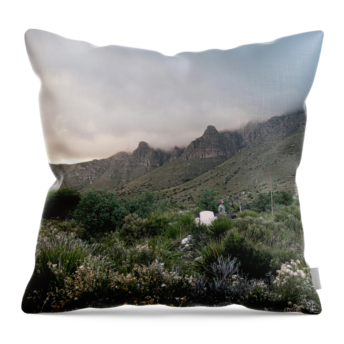 Scenics Throw Pillow featuring the photograph A Camper Looks Into The Sky At The by Bud Force