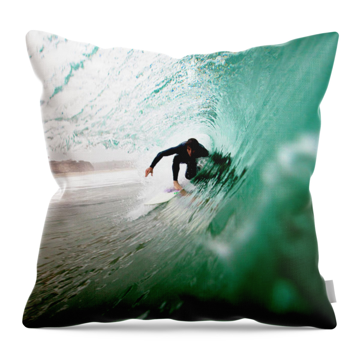 Young Men Throw Pillow featuring the photograph A Male Surfer Pulls Into A Barrel While by Kyle Sparks
