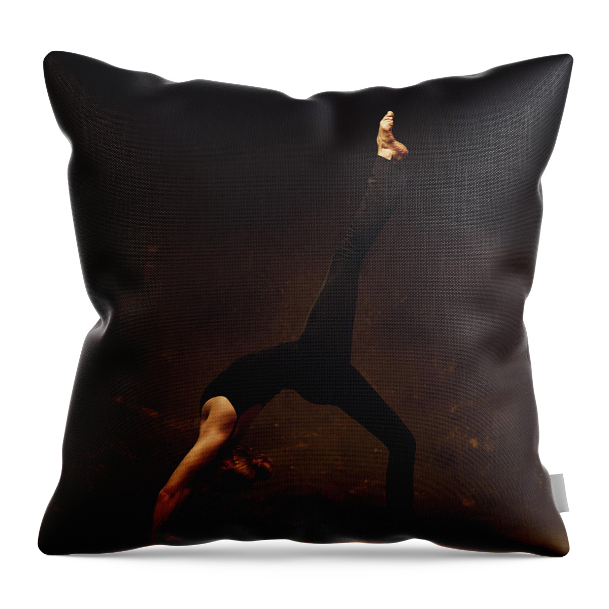 Ballet Dancer Throw Pillow featuring the photograph A Young Caucasian Female Dancer In A by Photodisc