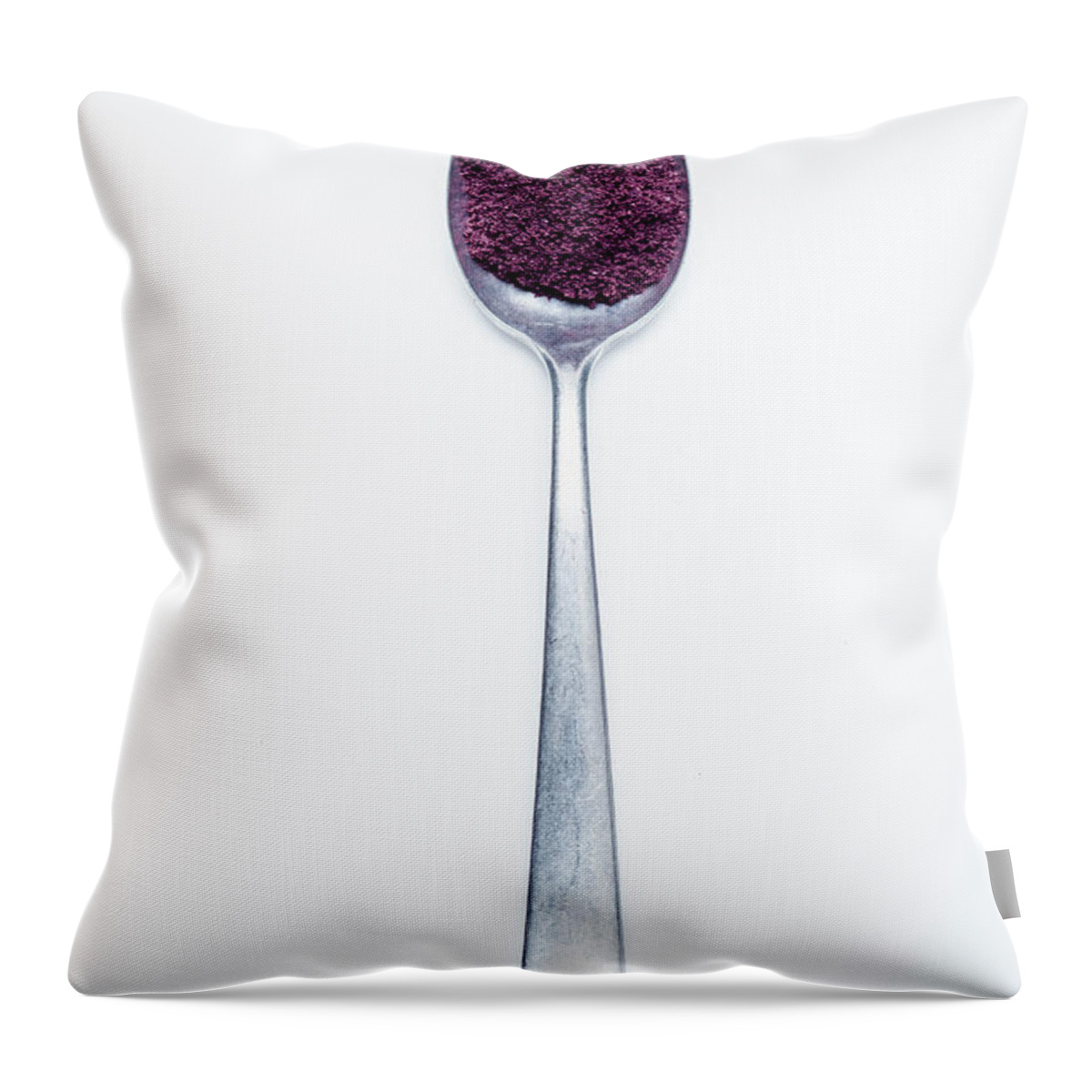 Ip_12429555 Throw Pillow featuring the photograph Acai Berry Powder On A Spoon Against A White Background by Eising Studio