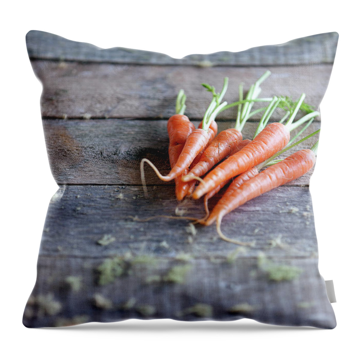 Outdoors Throw Pillow featuring the photograph Baby Carrots On Rustic Table by Devin Hart