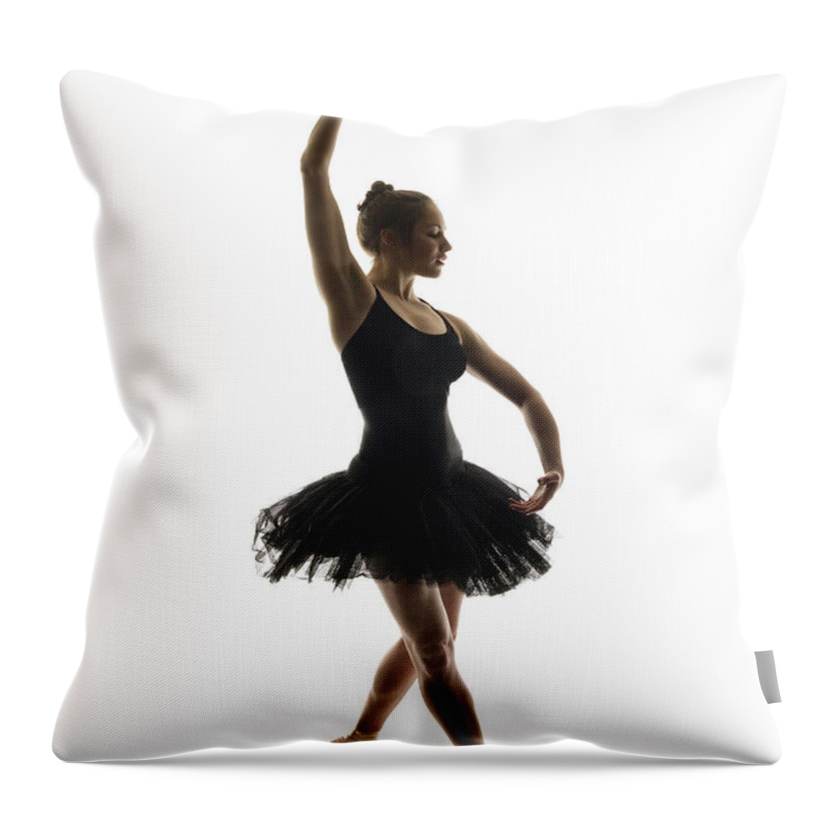 Ballet Dancer Throw Pillow featuring the photograph Ballerina In A Tutu Dancing En Pointe by Phil Payne Photography