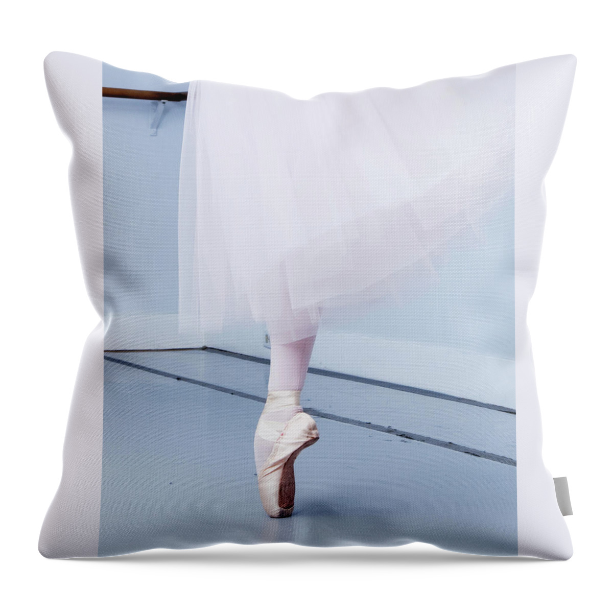 Expertise Throw Pillow featuring the photograph Ballerina On Pointe Low Angle View by Jonya