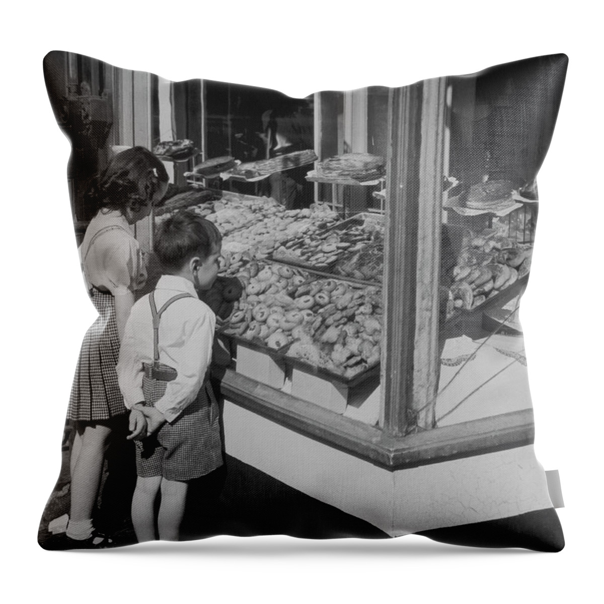 Child Throw Pillow featuring the photograph Boy And Girl Looking In At Bakery by Fpg