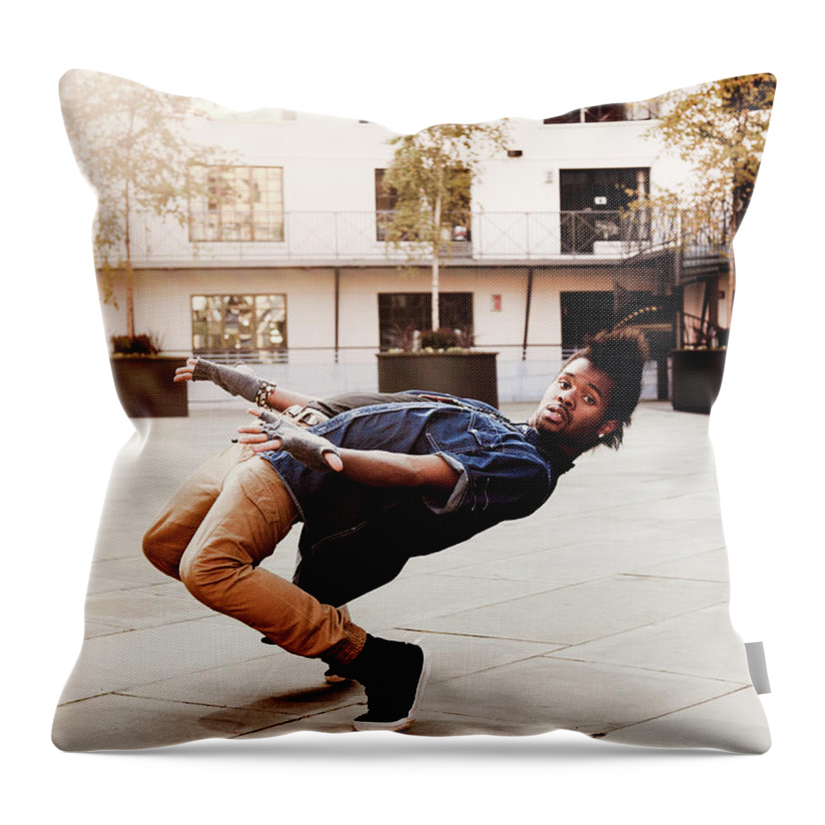 Shadow Throw Pillow featuring the photograph Break Dancer At Courtyard by John And Tina Reid