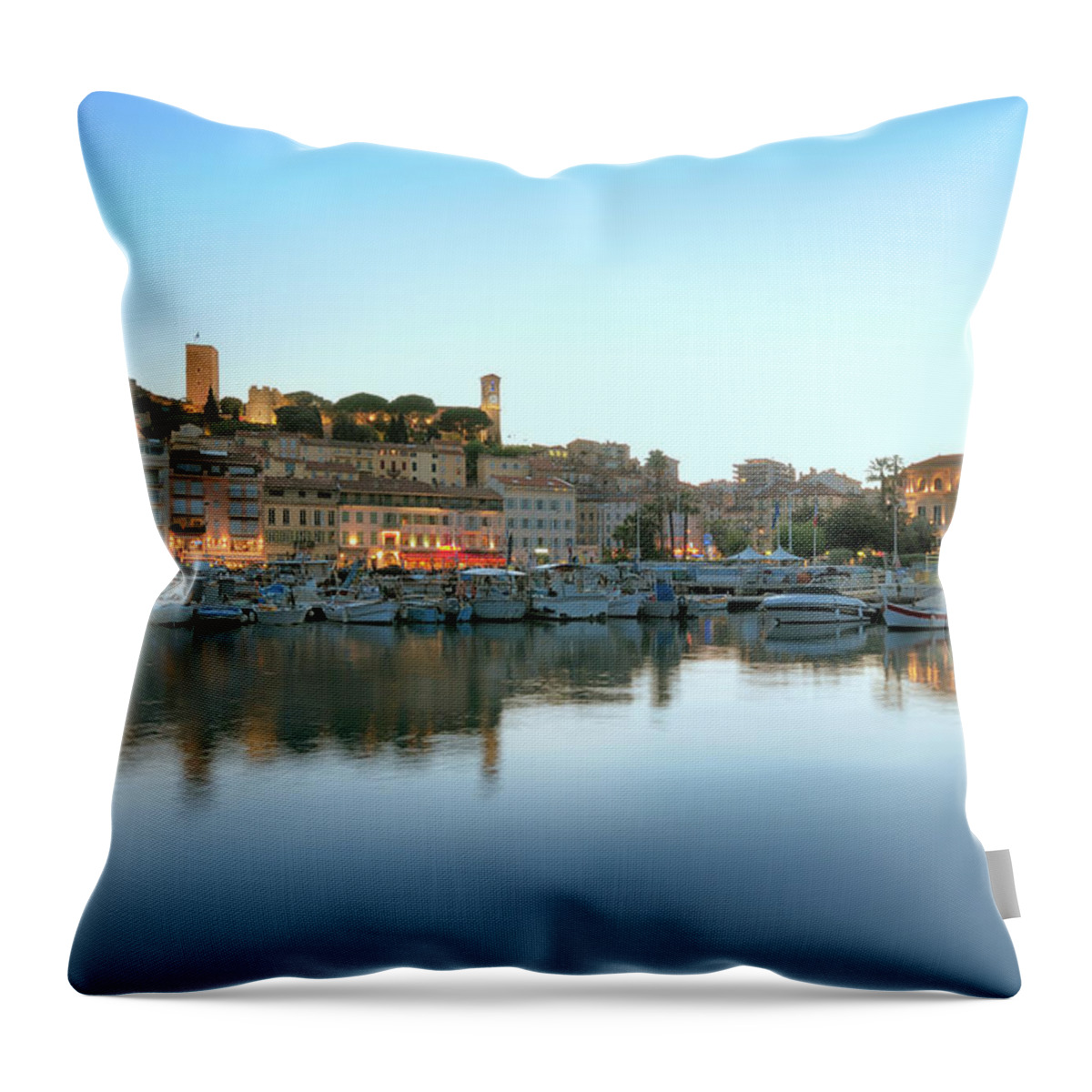 Water's Edge Throw Pillow featuring the photograph Cannes In The Evening Viewed From Harbor by Nikitje