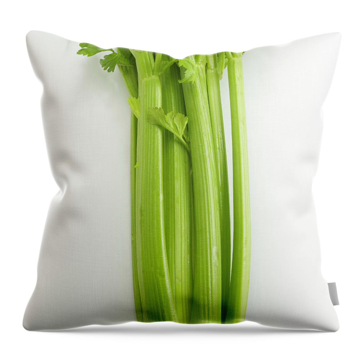 White Background Throw Pillow featuring the photograph Celery by David Bishop Inc.