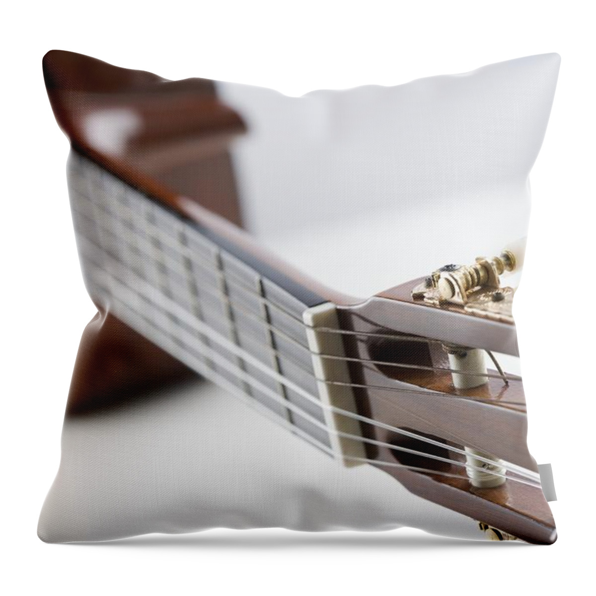 White Background Throw Pillow featuring the photograph Close-up Of A Guitar by Jamie Grill
