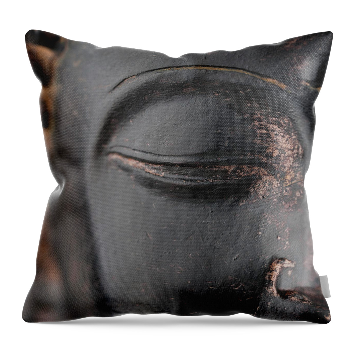 Statue Throw Pillow featuring the photograph Closeup Of Black Stone Buddha Face by Wesvandinter