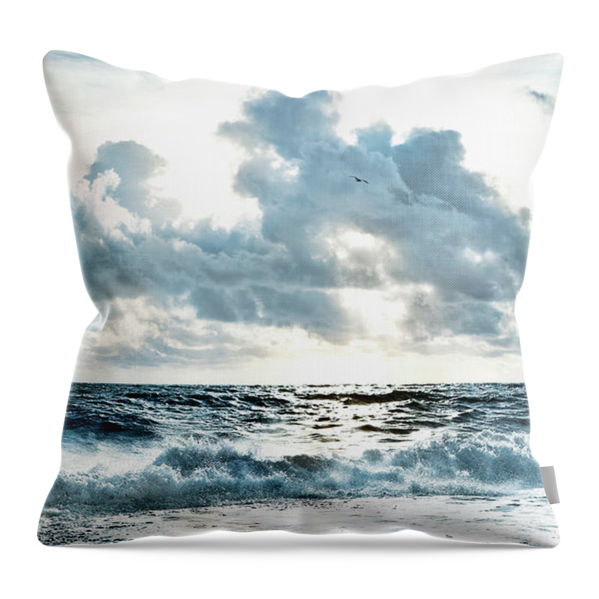 Tranquility Throw Pillow featuring the photograph Cloudy Sky Over Stormy Waves On Beach by Chris Clor