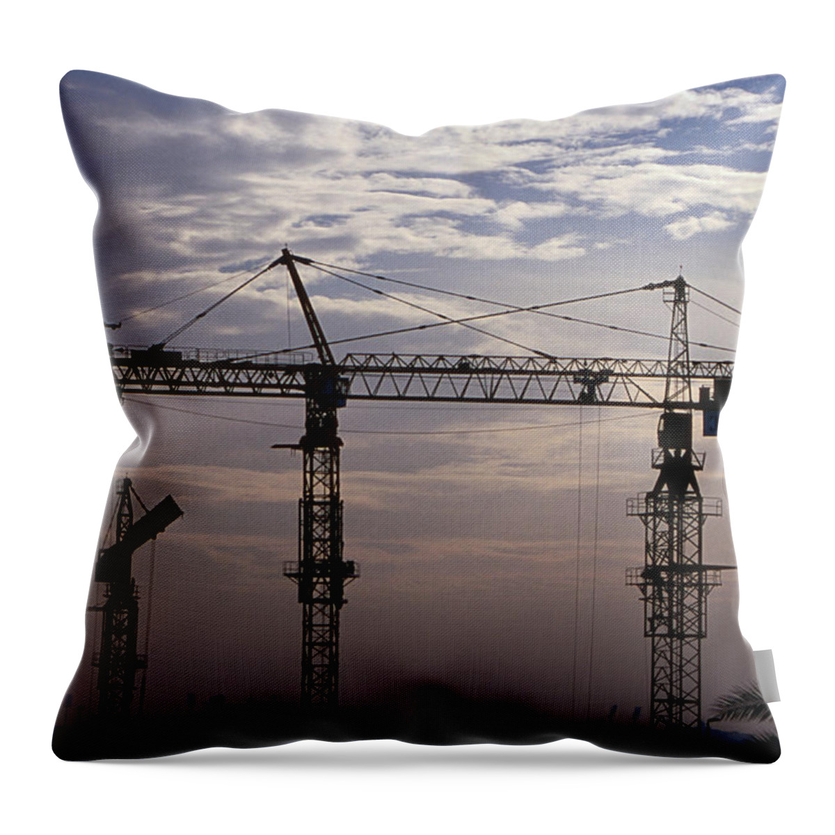 Outdoors Throw Pillow featuring the photograph Construction Site Cranes At Sunset by Lonely Planet