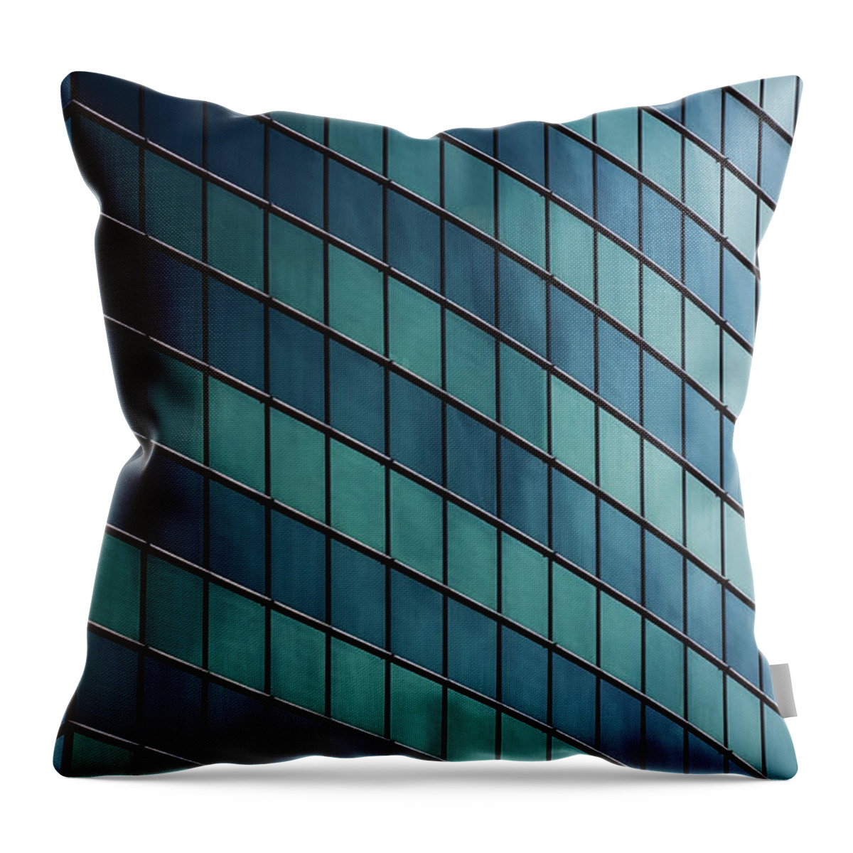 Outdoors Throw Pillow featuring the photograph Curving Facade Of Skyscraper by Photo By John Crouch