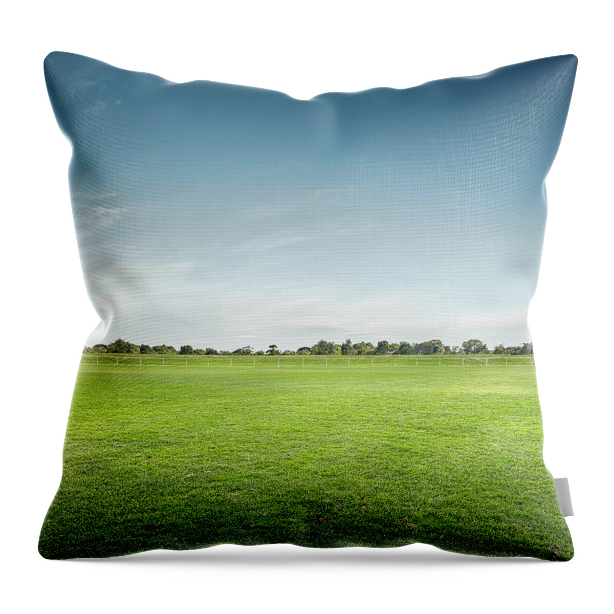 Tranquility Throw Pillow featuring the photograph Empty Sports Ground by Aaron Foster
