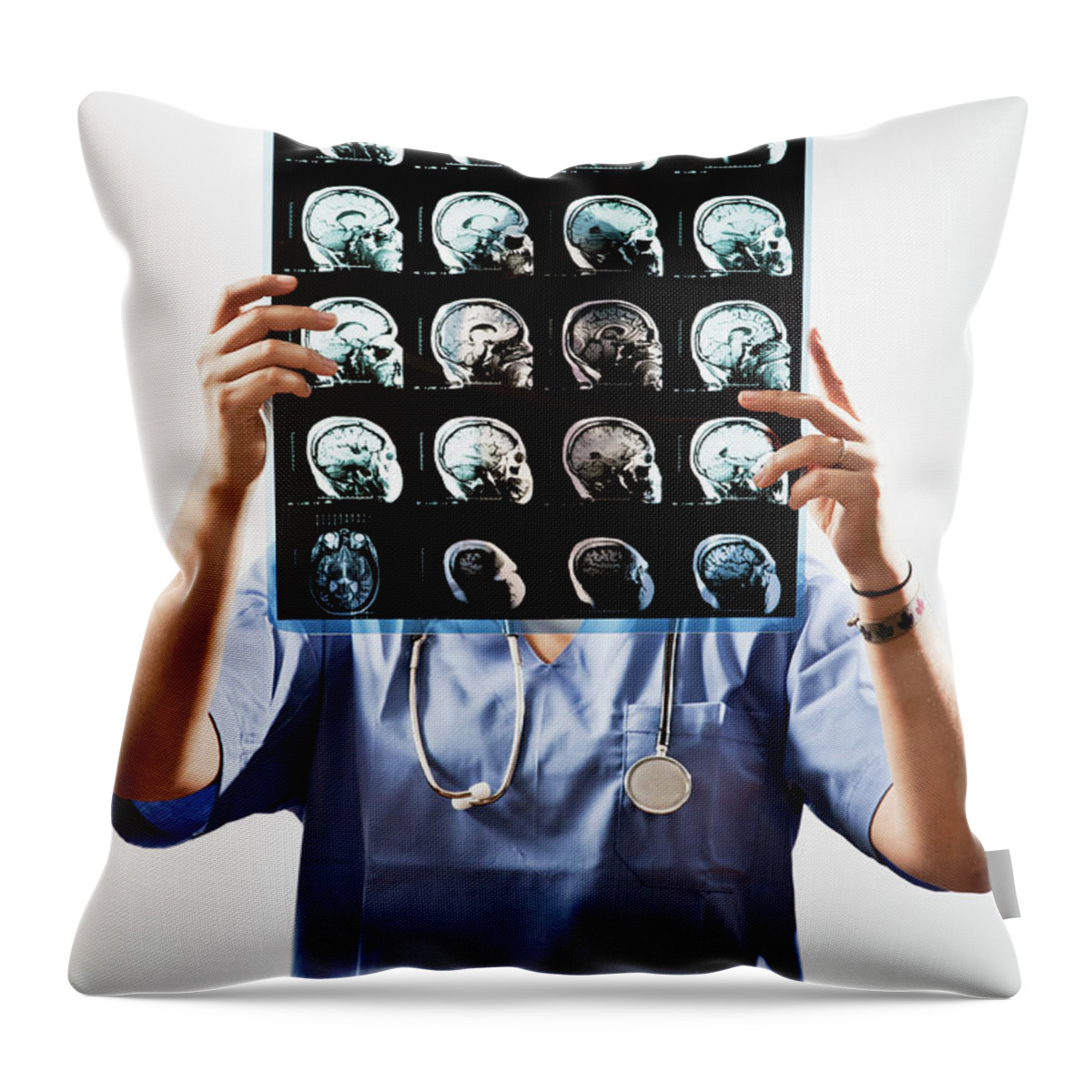 Expertise Throw Pillow featuring the photograph Female Doctor Holds Up Mri In Front Of by Ron Levine