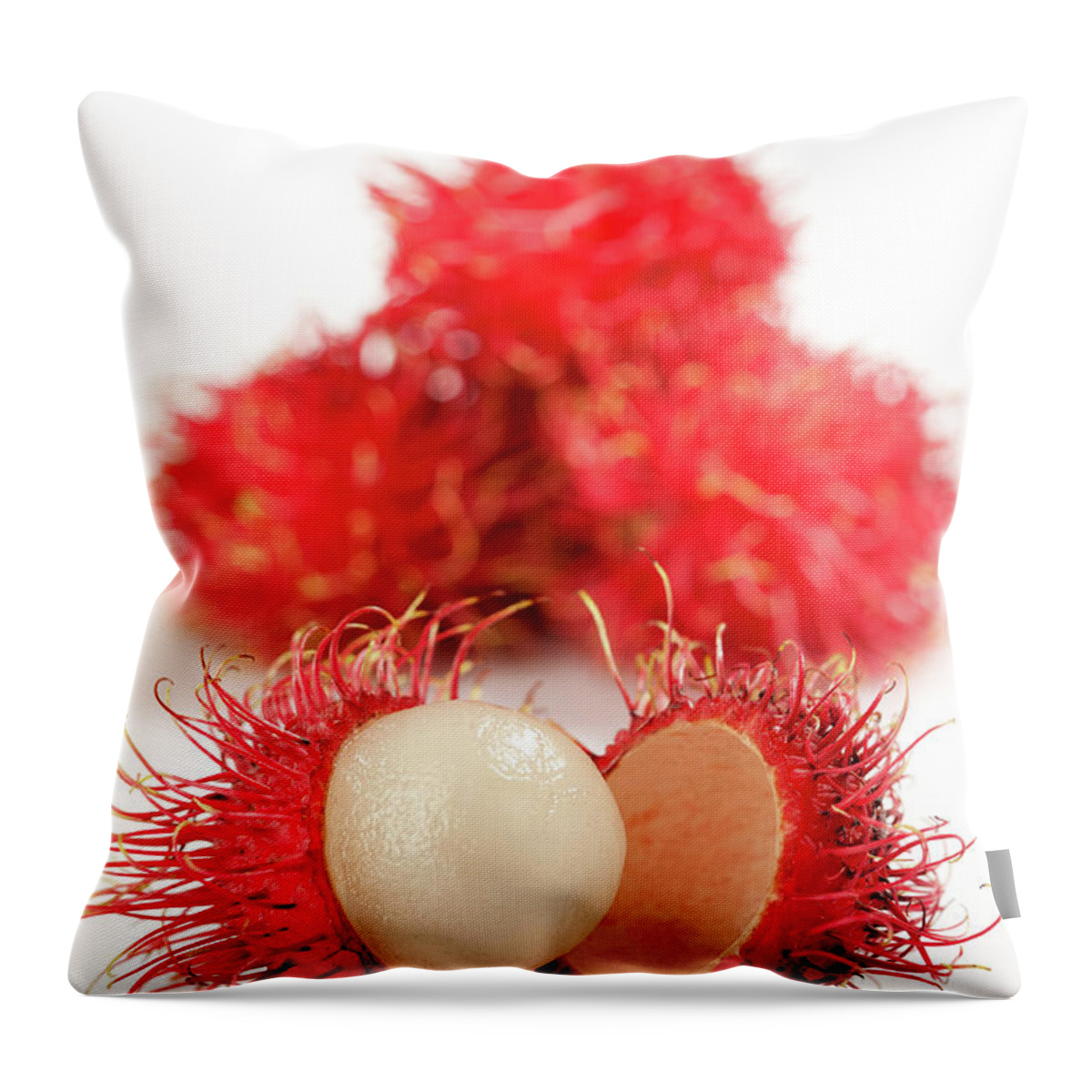 Raw Food Diet Throw Pillow featuring the photograph Fresh Thai Rambutans by Enviromantic