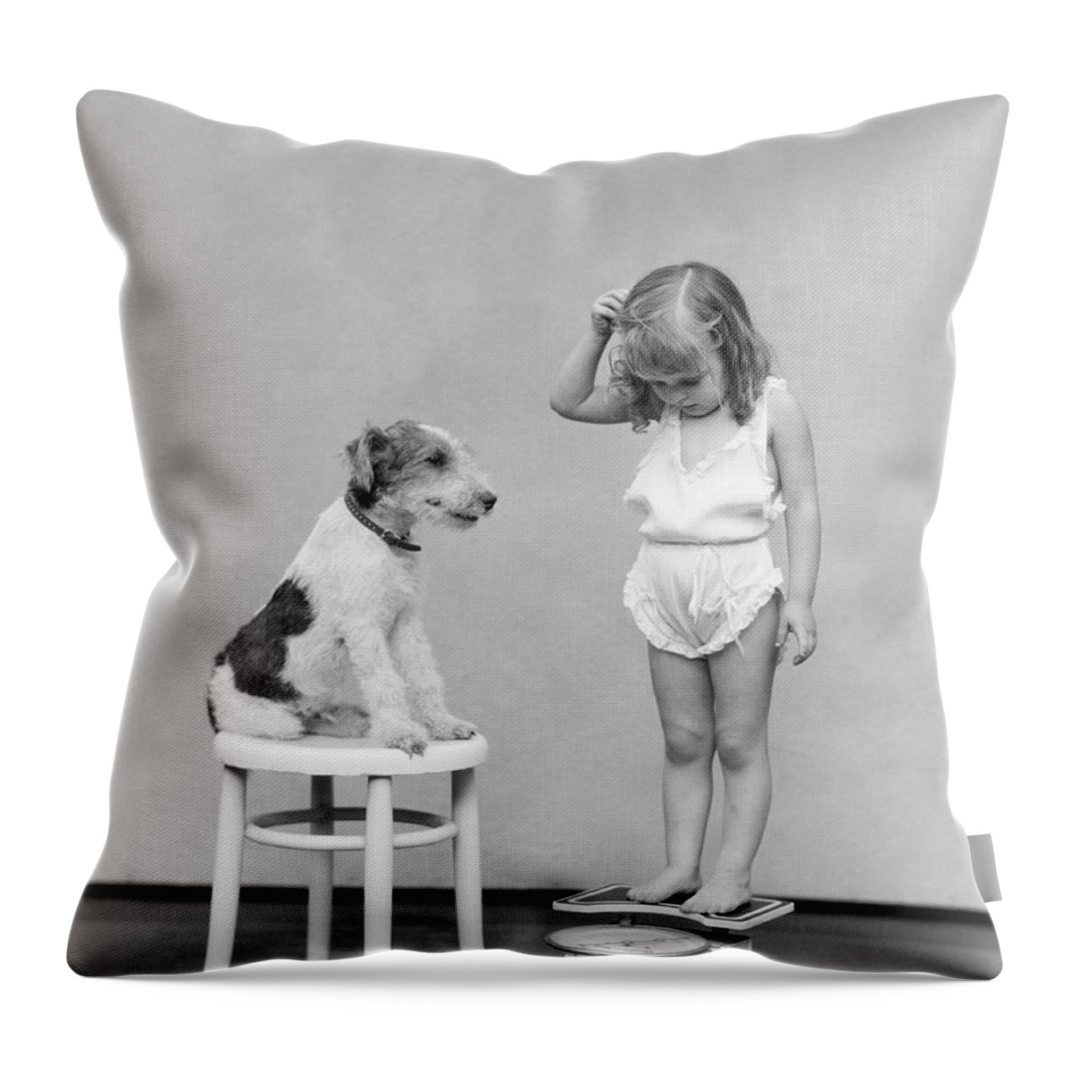 Child Throw Pillow featuring the photograph Girl Standing On Scales, Looking Down by H. Armstrong Roberts