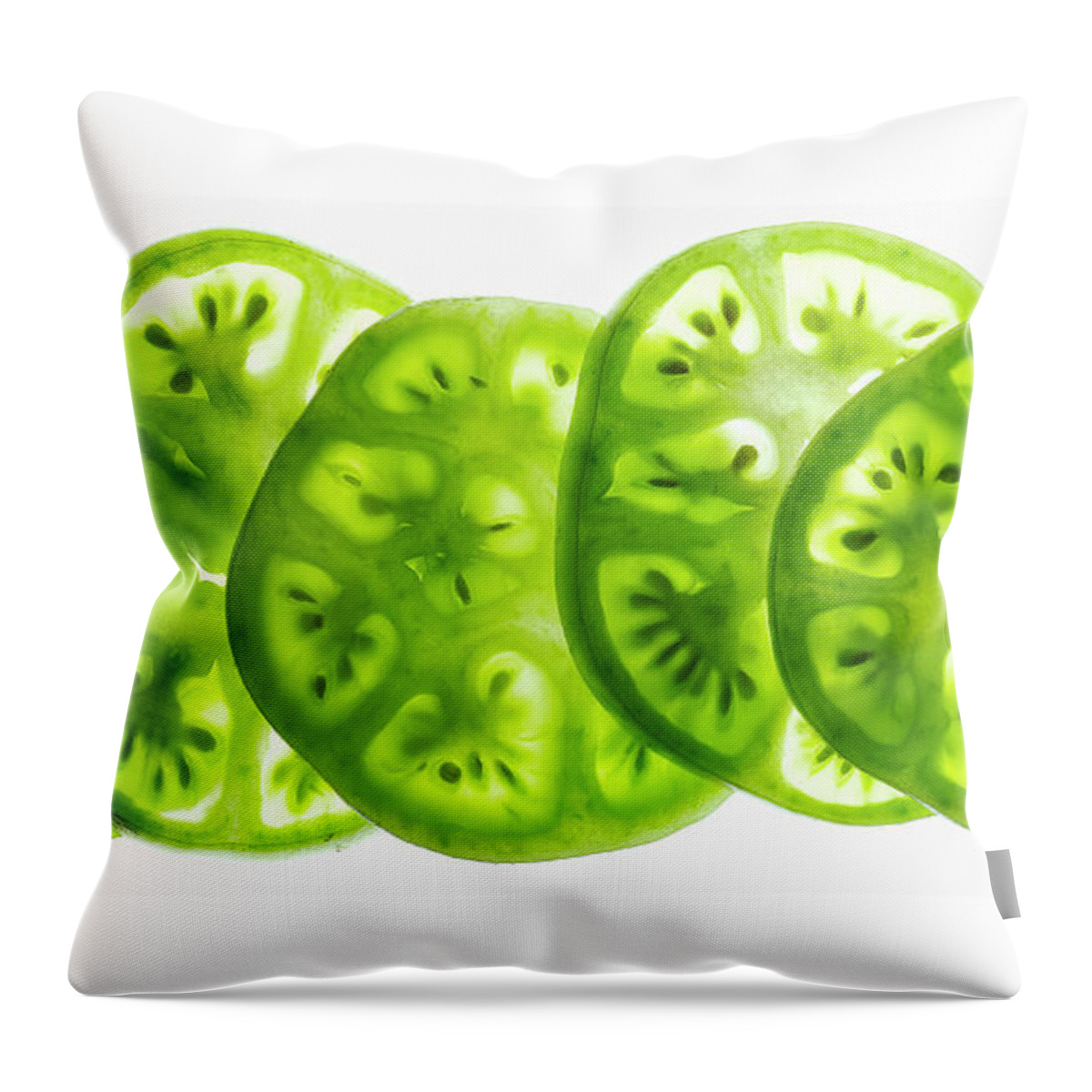 Five Objects Throw Pillow featuring the photograph Green Tomato Slices On A White by Howard Bjornson