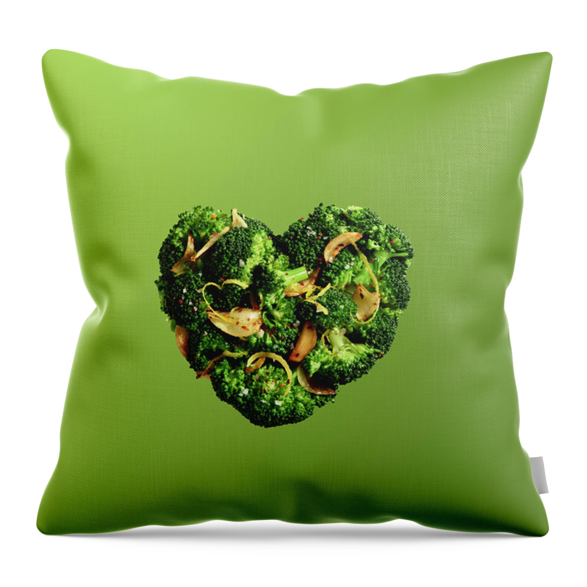 Broccoli Throw Pillow featuring the photograph Heart Shaped Broccoli On Green by Maren Caruso