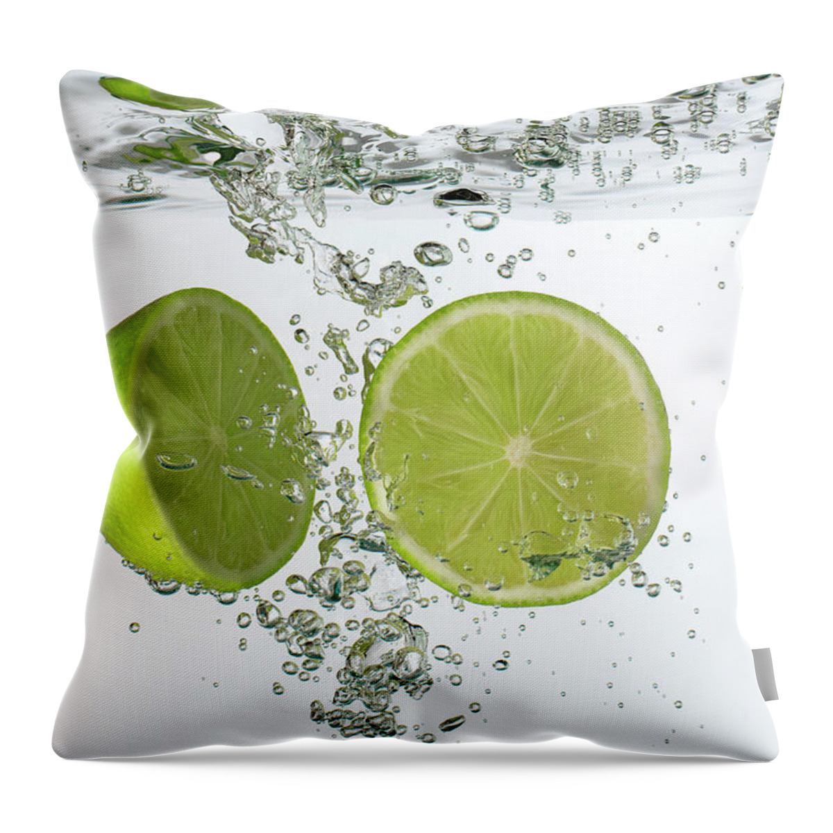 Vitamin C Throw Pillow featuring the photograph Lime Halves Submerged In Water by Photoalto/neville Mountford-hoare