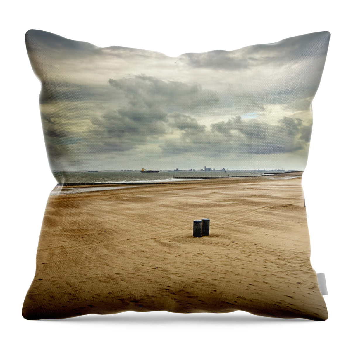 Water's Edge Throw Pillow featuring the photograph Loomy Sky Over Wide Angle Beach by Noctiluxx