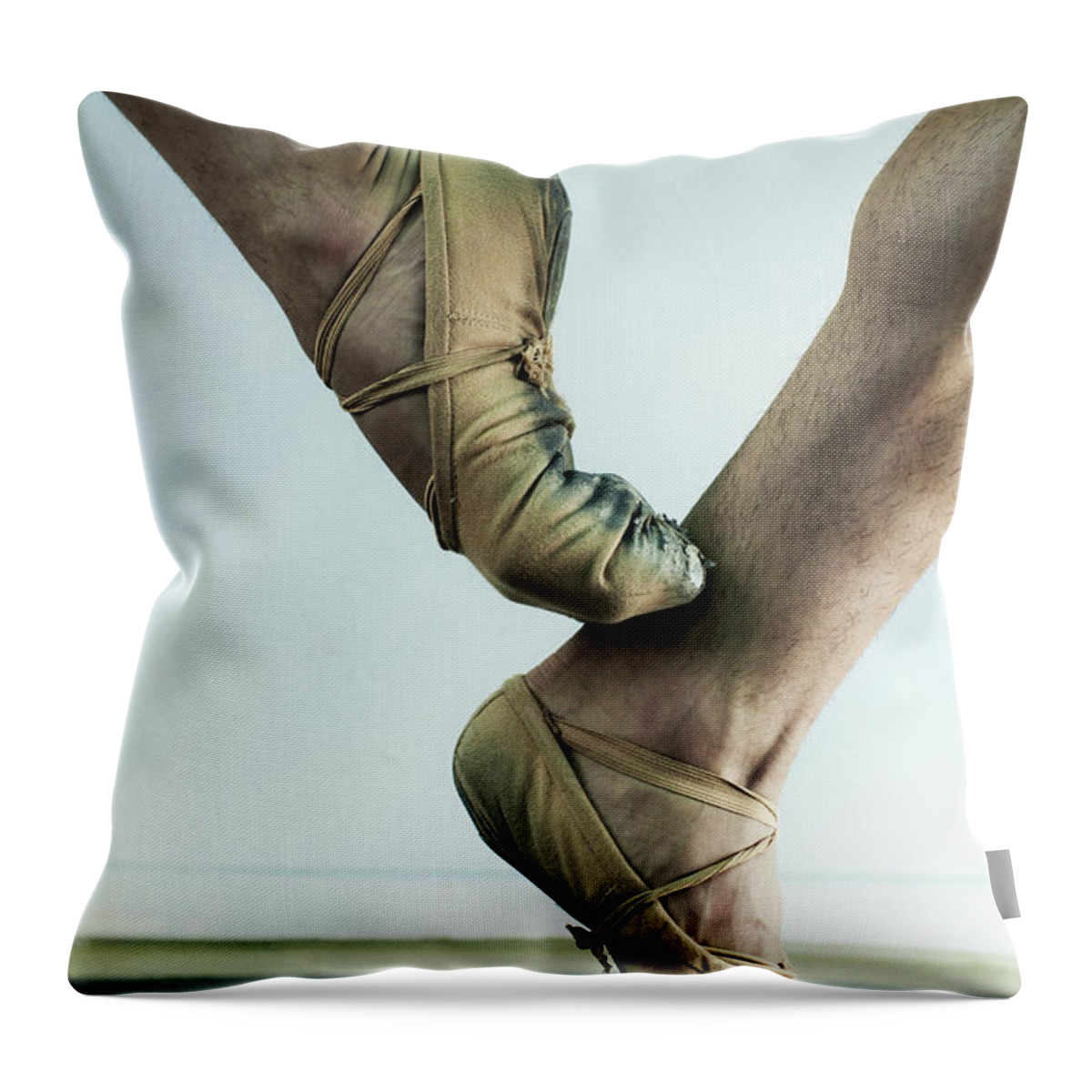 Ballet Dancer Throw Pillow featuring the photograph Male Ballet Dancer Balancing On Toe by Patrik Giardino