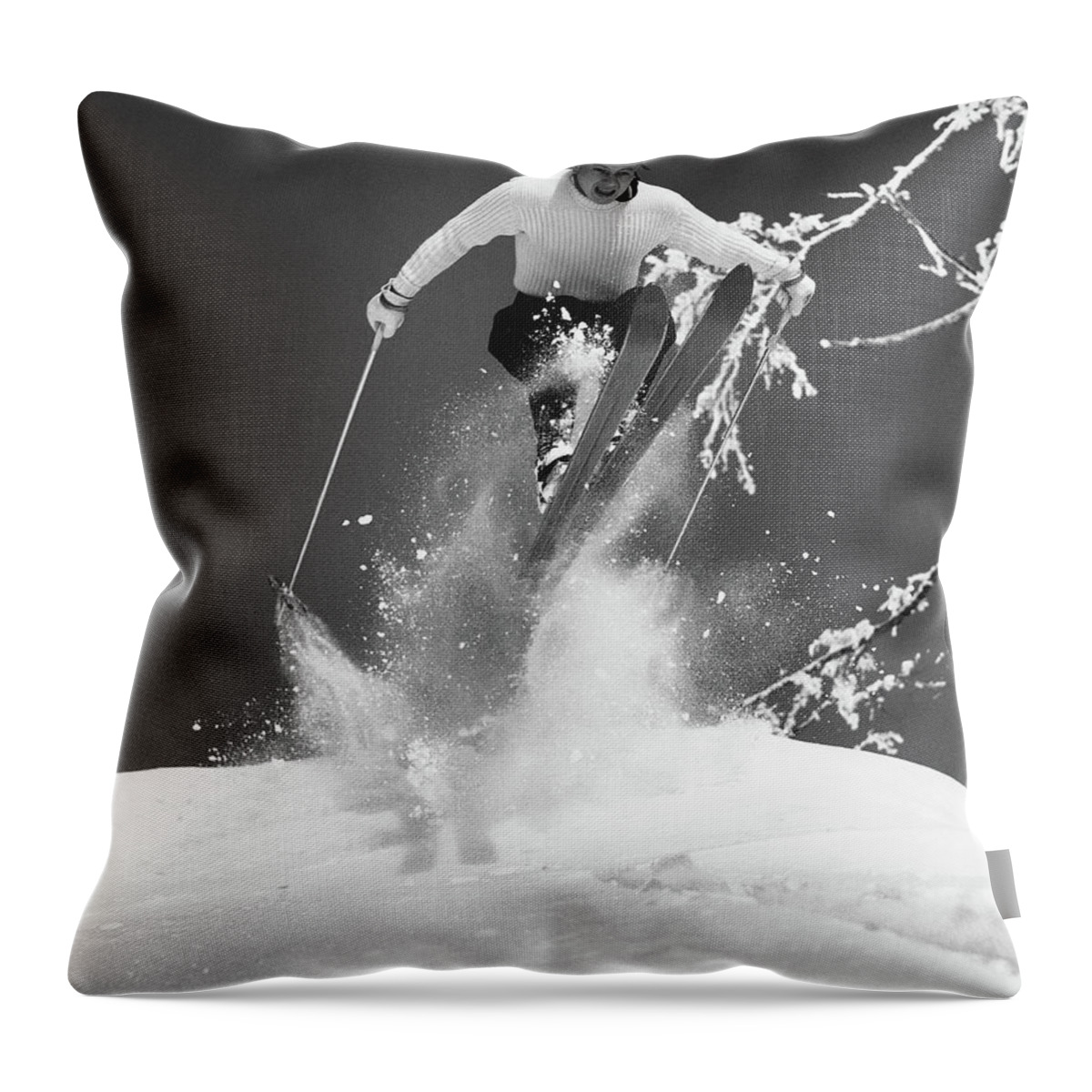 Skiing Throw Pillow featuring the photograph Man Jumping Through Air On Skis by Stockbyte