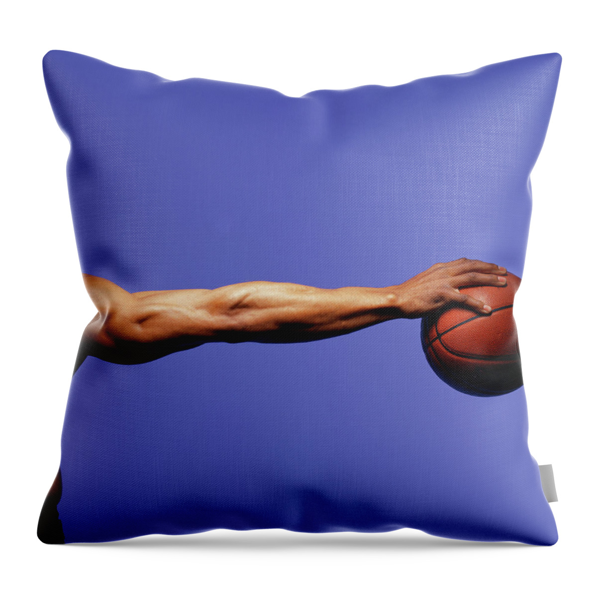 Human Arm Throw Pillow featuring the photograph Man Palming Basketball, Close-up Of Arm by Blaise Hayward