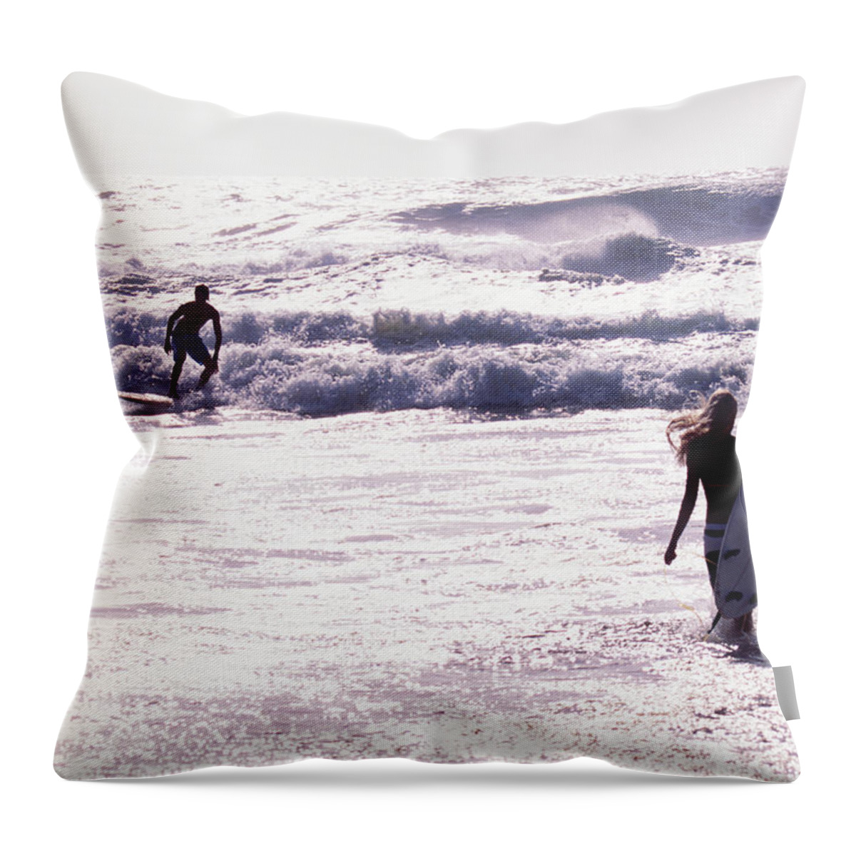 Wind Throw Pillow featuring the photograph Man Surfing On Sea, Woman Walking With by Johner Images