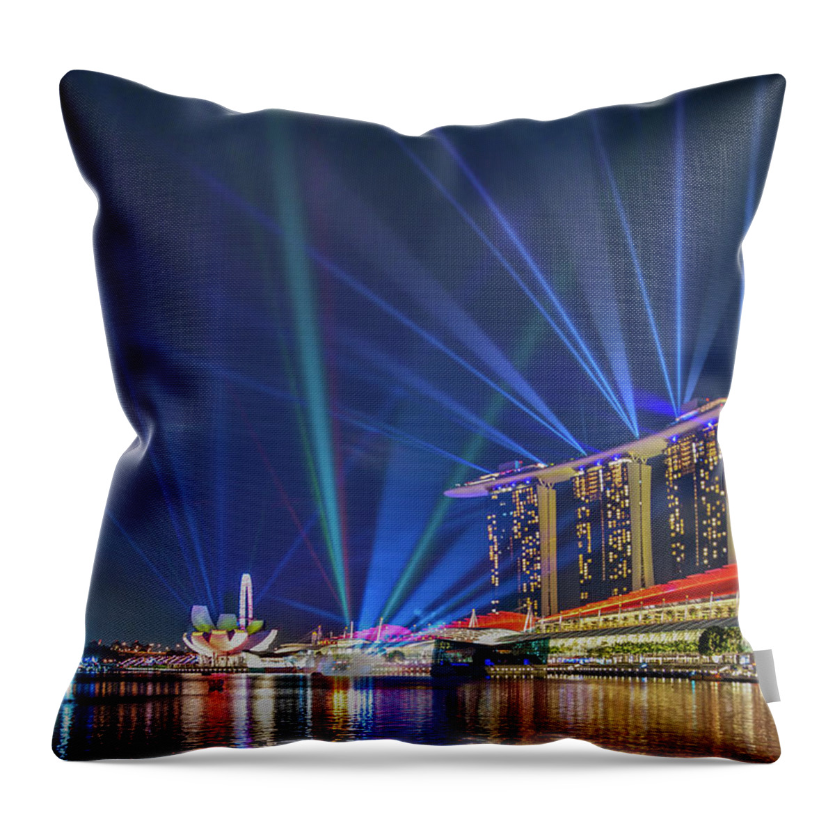 Laser Throw Pillow featuring the photograph Marina Bay Light Show by Coolbiere Photograph
