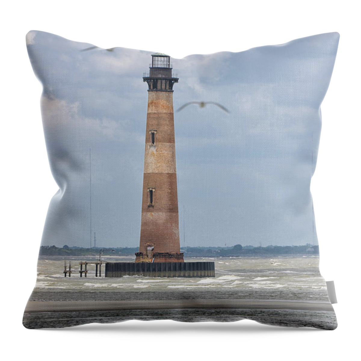 Morris Island Lighthouse Throw Pillow featuring the photograph Maritime Lighthouse Symbol by Dale Powell