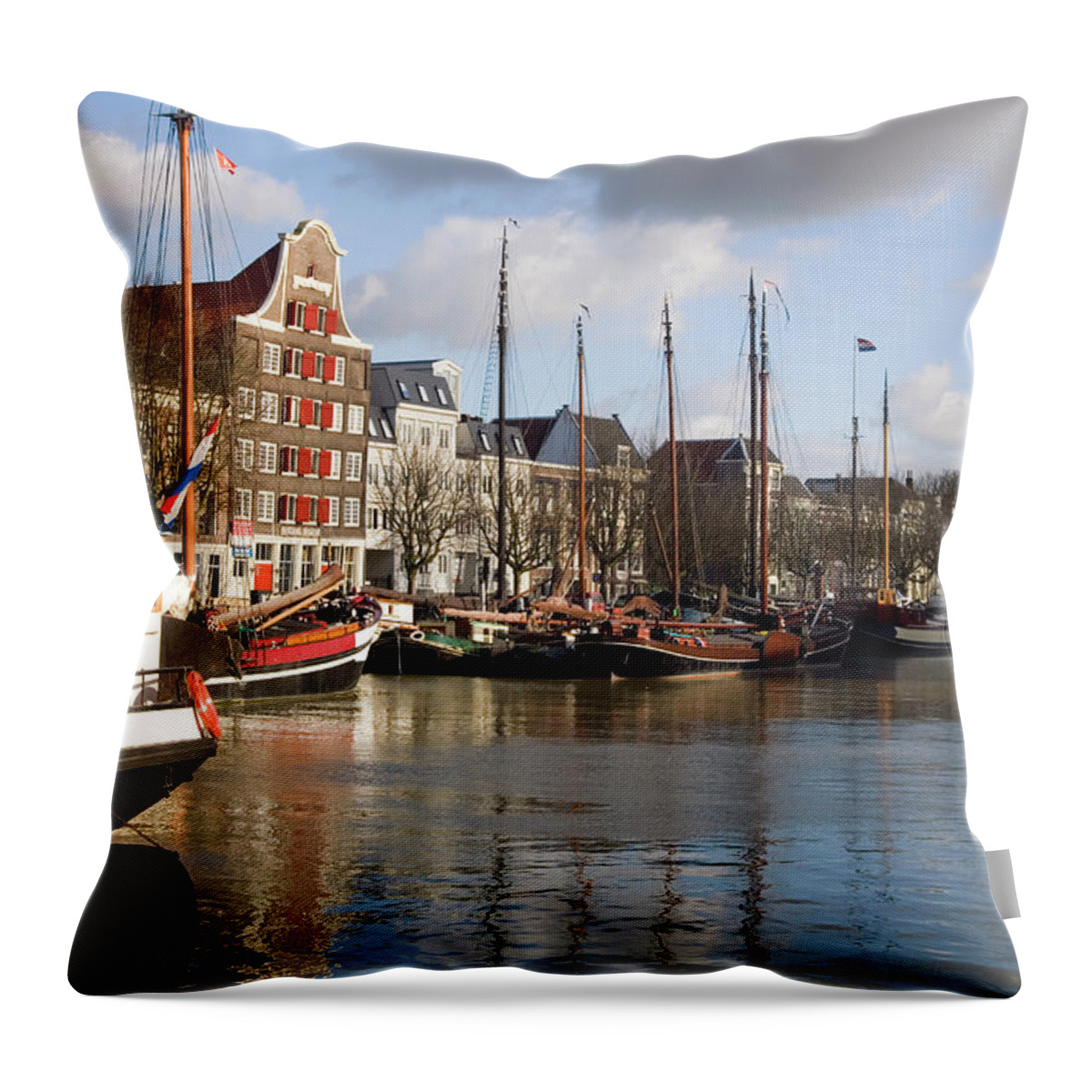 Netherlands Throw Pillow featuring the photograph Medieval Harbour With Traditional Ships by Roel Meijer