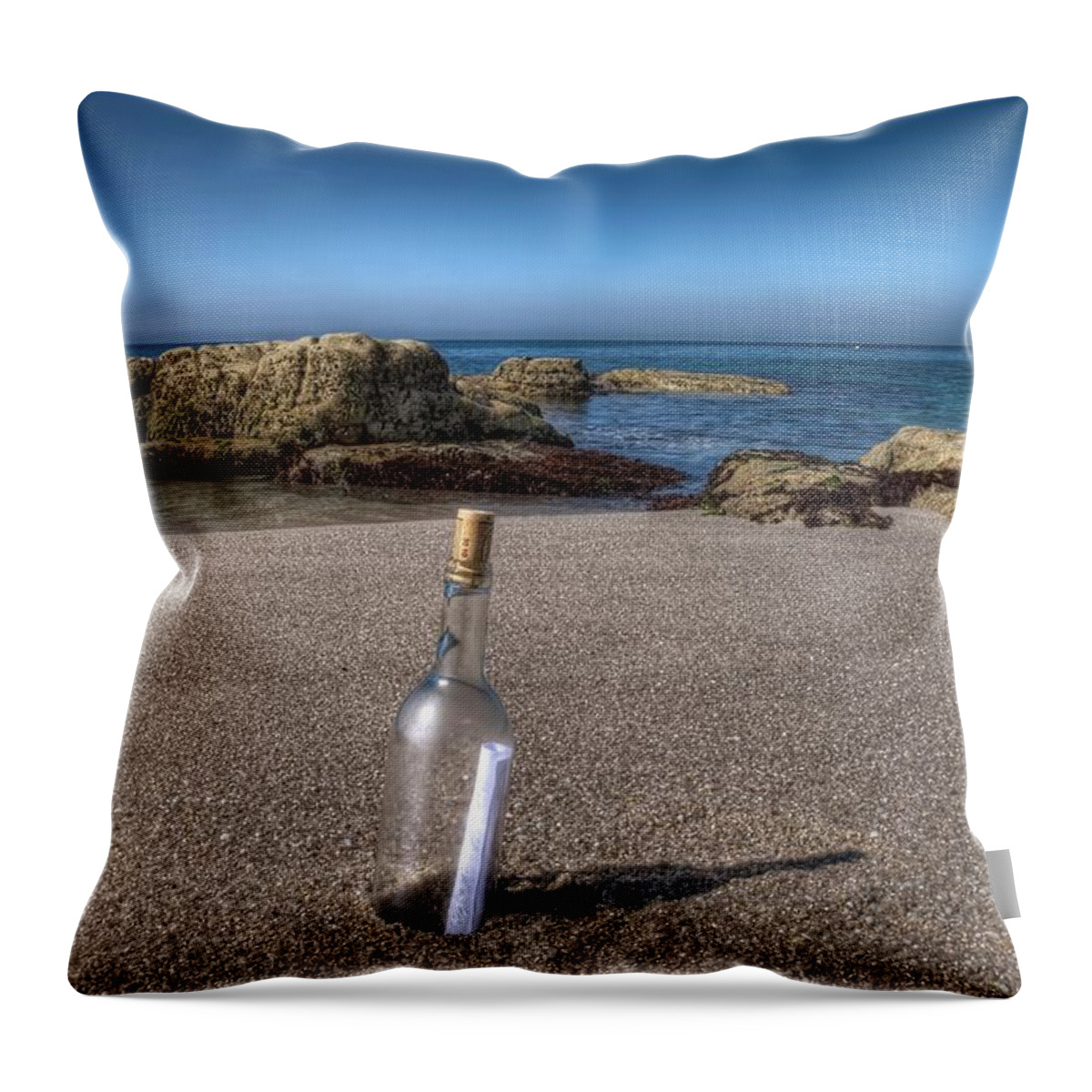 Tranquility Throw Pillow featuring the photograph Message In The Bottle by Emmanuel Lemée Photographie