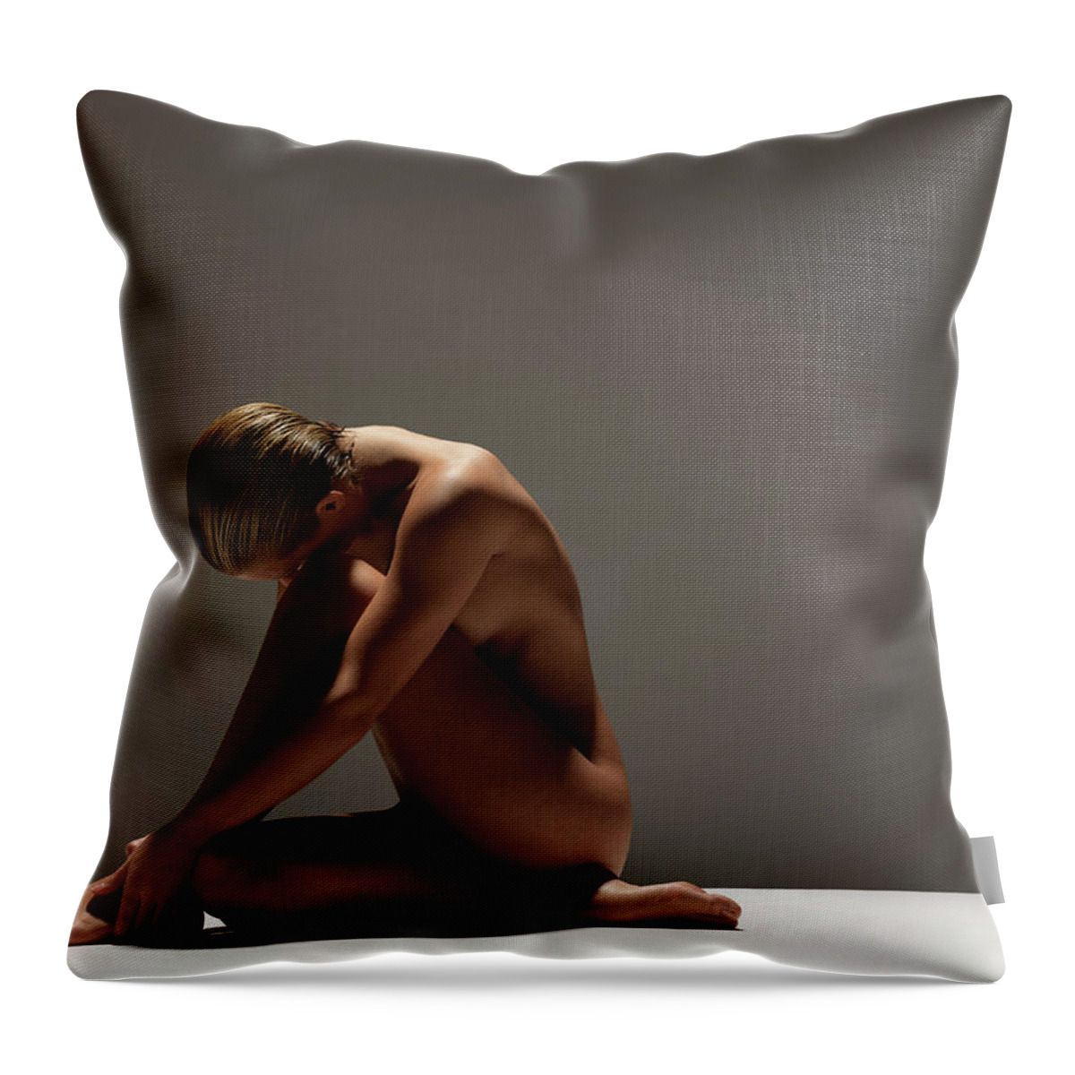 Leaning Throw Pillow featuring the photograph Naked Woman Sitting by John Lamb