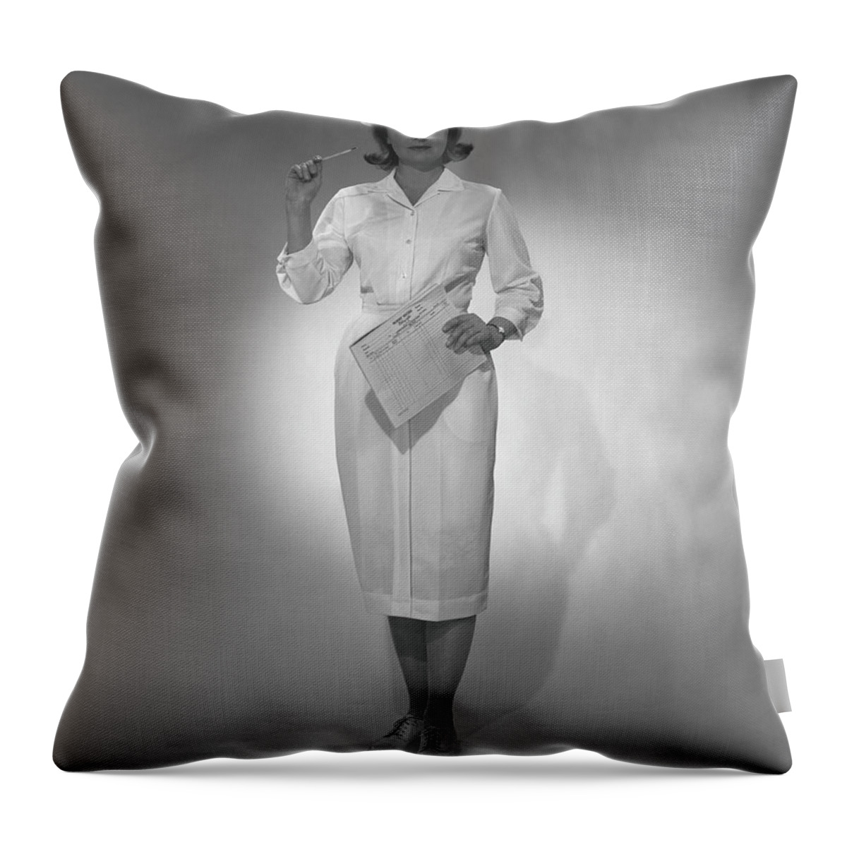 Mid Adult Women Throw Pillow featuring the photograph Nurse Holding Medical Chart Posing In by George Marks