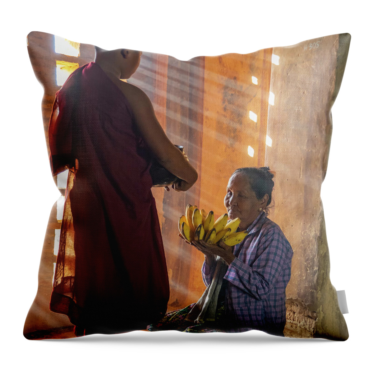 Boy Throw Pillow featuring the photograph offering to young Buddhist monk by Ann Moore
